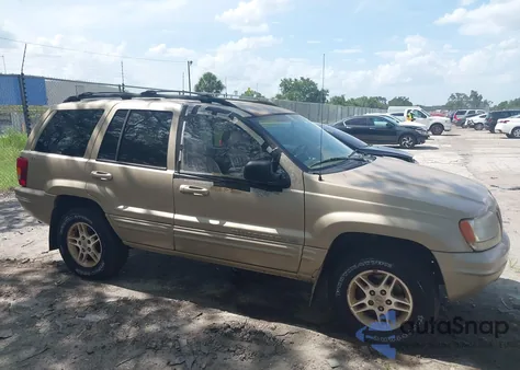 1999 Jeep Grand Cherokee Limited z USA, uszkodzony, nr VIN 1J4GW68S3XC580949